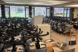 office chairs stacked in office